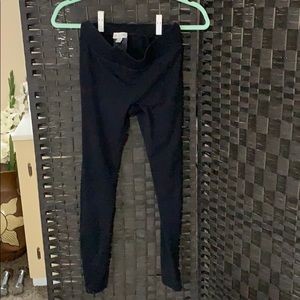 Stretch fit guess pants with open lattice pattern.